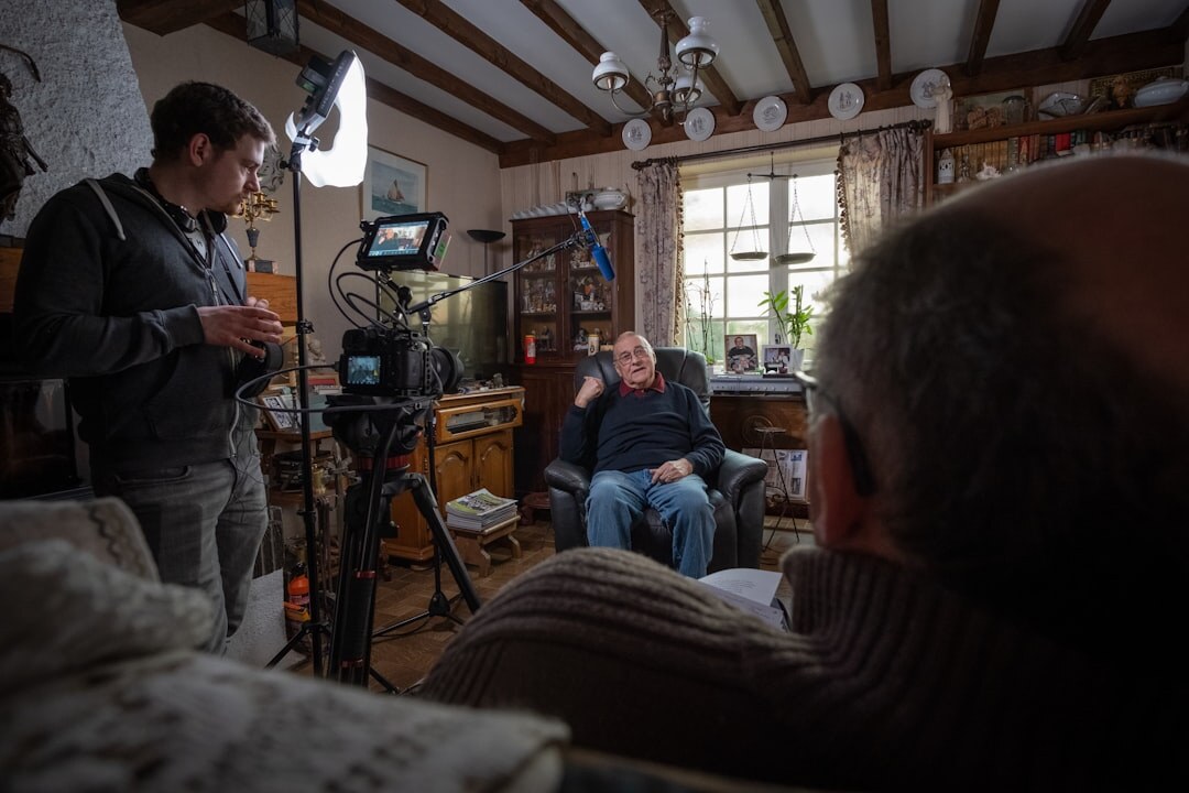 photographer interviewing elder