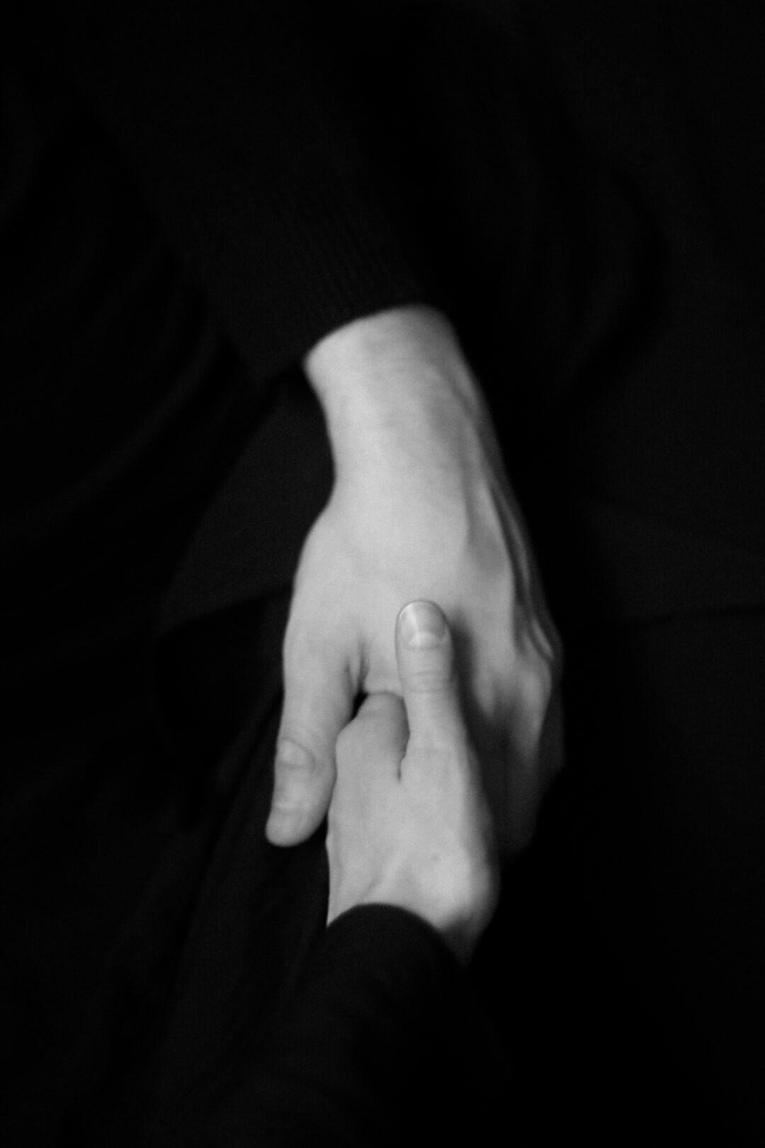 hands folded in lap